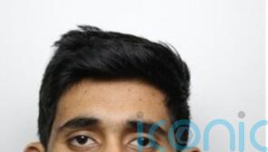 Search for suspect continues after woman pushing pram stabbed to death in street