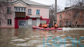 Russians stage rare protest after dam bursts and homes flood