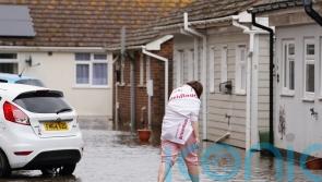 Rescue operations under way as West Sussex river breaks its banks