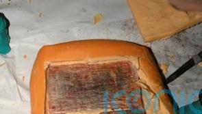 Two jailed after cocaine found hidden inside blocks of cheese