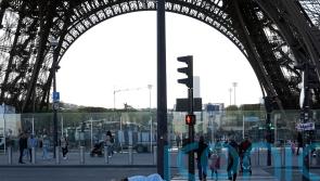 French police evict hundreds from abandoned Paris warehouse ahead of Olympics