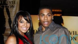 US stars Ashanti and Nelly are engaged and expecting first child together