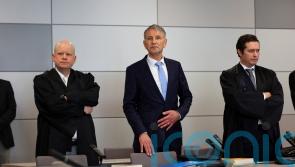 Far-right politician stands trial in Germany over alleged use of Nazi slogan