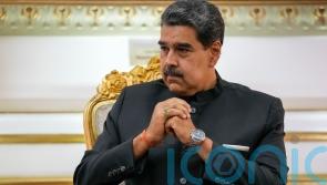 Venezuela’s main opposition bloc agrees on candidate to challenge Maduro