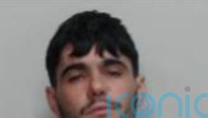Police hunt prisoner who fled from guards during funeral