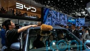 Tesla founder Musk visits China as competitors show off new electric vehicles