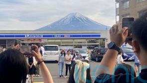 Town building big screen to block view of Mount Fuji in bid to deter tourists