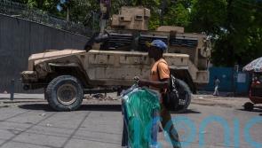 Haiti’s transitional council names new PM amid hopes of quelling violence