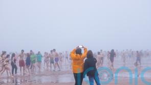 St Andrews students take the plunge with traditional May Dip