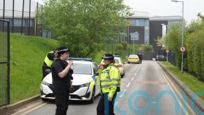 Teenager arrested as school goes into lockdown after three injured