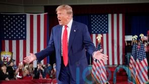 Trump calls judge ‘crooked’ after he was warned of jail if he violates gag order