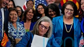 Arizona governor repeals 1864 law banning almost all abortions in the state
