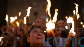 Orthodox worshippers greet ancient ceremony of the Holy Fire in Jerusalem