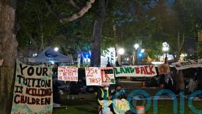 Police surround pro-Palestinian encampment on Californian university