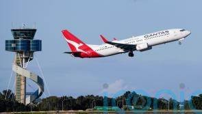 Qantas agrees to payouts for selling seats on cancelled flights
