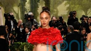 British model Adwoa Aboah highlights pregnancy with two-piece Met Gala gown
