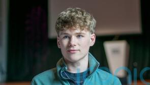 Student returns to American football team as coach after spinal cord injury
