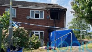Third man arrested after two women killed in house fire