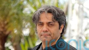 Iranian filmmaker flees to Europe after prison sentence ahead of Cannes premiere