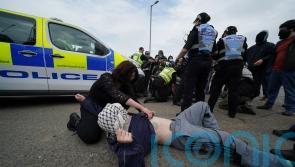 Four charged and six officers injured at pro-Palestine demonstration