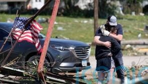 Five dead and dozens injured in tornadoes that tore through Iowa, say officials