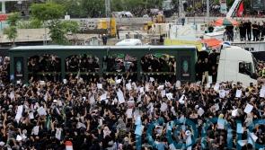 Iran begins burying late president and others killed in helicopter crash