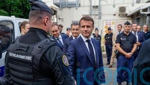 Macron says he will not force through voting reform in troubled New Caledonia