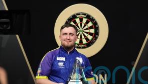Luke Littler hits nine-darter as he storms to Premier League glory