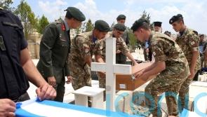 Families reclaim remains of 15 Greek soldiers killed in Cyprus in 1974