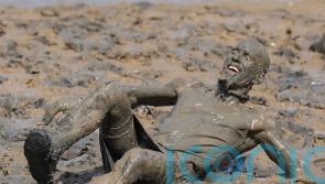 In Pictures: Mud glorious mud! Competitors raise charity cash in annual mud race