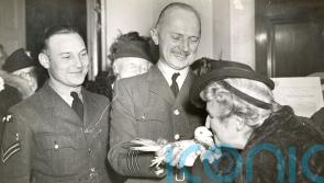 Pigeons and parachuting dog decorated as D-Day heroes