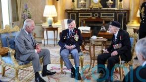 King and Queen hear moving recollections from D-Day veterans at Palace