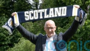 Swinney announces cash boost for football scheme to tackle child poverty