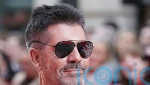 Simon Cowell says becoming a father saved his life after death of parents