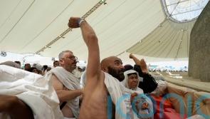 Muslim pilgrims wrap up Hajj with symbolic stoning of the devil amid deadly heat