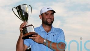 Scottie Scheffler wins Travelers play-off after protesters storm 18th green