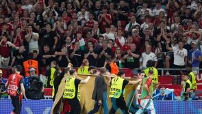 Hungary forward Barnabas Varga stable in hospital after going off on stretcher