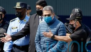 Former Honduran president sentenced for helping traffickers get cocaine into US