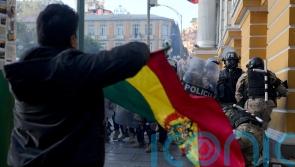 Military flees Bolivia government palace after coup attempt fails