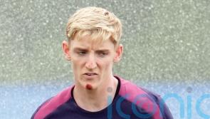 Chin up Anthony! Gordon the butt of jokes in England camp after bike fall