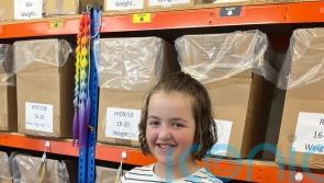 Girl who cut off 13 inches of hair to make cancer wig eyes world record