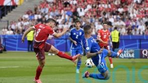Switzerland stun holders Italy to reach last eight of Euro 2024