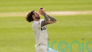 Surrey have the edge after 14 wickets fall on second day of top-of-table clash
