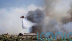 Firefighters tackle blazes on Greek islands of Chios and Kos