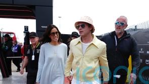 Brad Pitt and girlfriend sport summer pastels at Silverstone – how to get the look