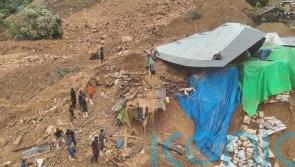 Heavy rain halts search for 30 people still missing after Indonesian landslide