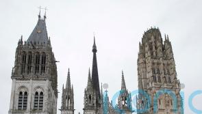 Fire in spire of medieval cathedral in French city of Rouen under control