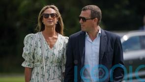Peter Phillips and girlfriend watch William triumph in charity polo cup