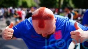 Barber who shaved St George cross into his hair among fans in Berlin