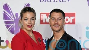 Couple Gemma Atkinson and Gorka Marquez prepare to back home teams in Euro final